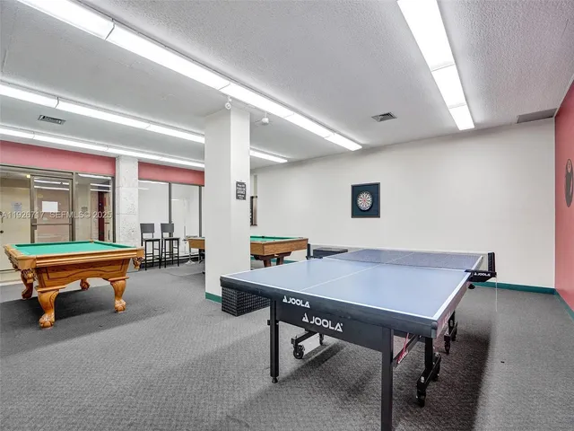 a view of a chairs and tables in the patio