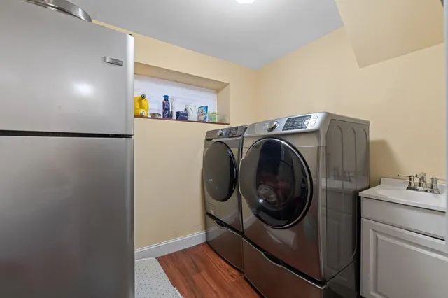 a utility room with dryer and washer