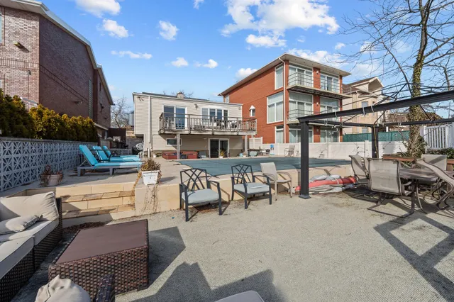 a view of a chairs and tables in the patio