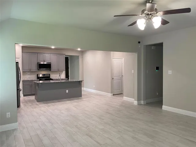 a view of kitchen and windows