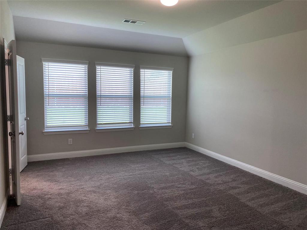 4162 Perch Drive Forney, TX 75126 - Photo 16 of 22 an empty room with a window