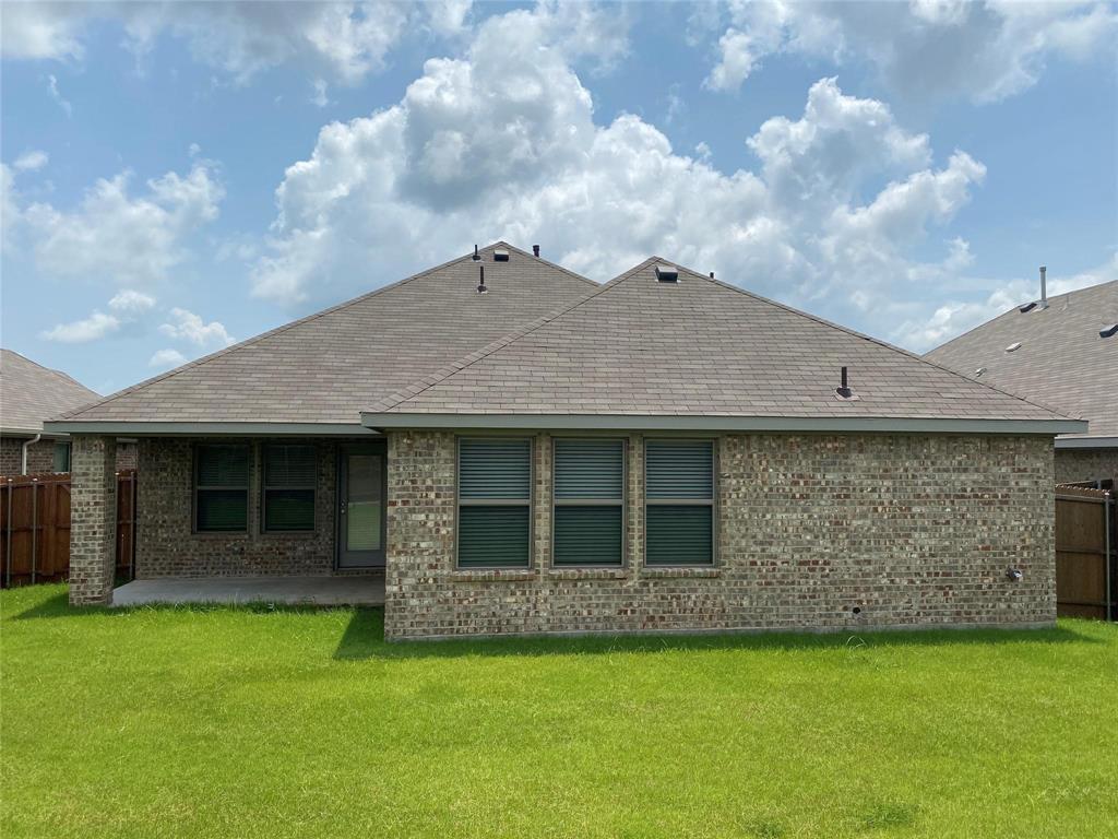 4162 Perch Drive Forney, TX 75126 - Photo 22 of 22 a backyard of a house with lots of green space