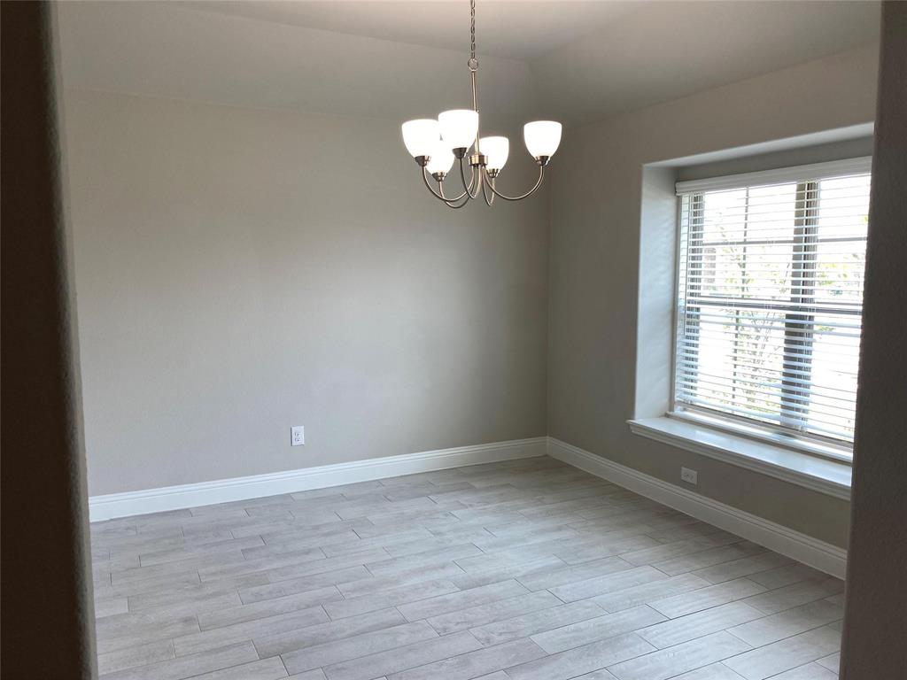 4162 Perch Drive Forney, TX 75126 - Photo 3 of 22 a window in an empty room with a window
