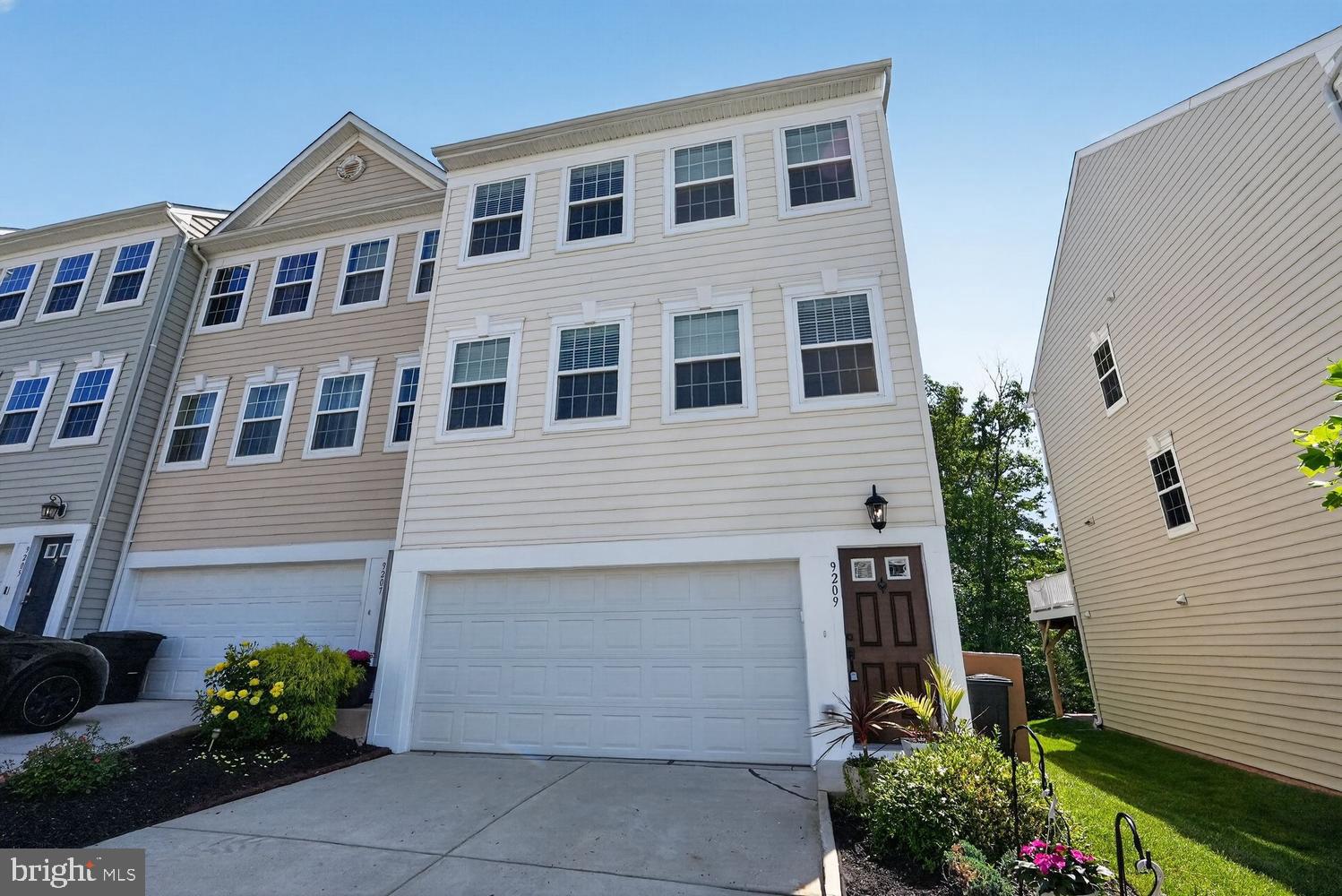 Front Exterior w/ 2-Car Garage
