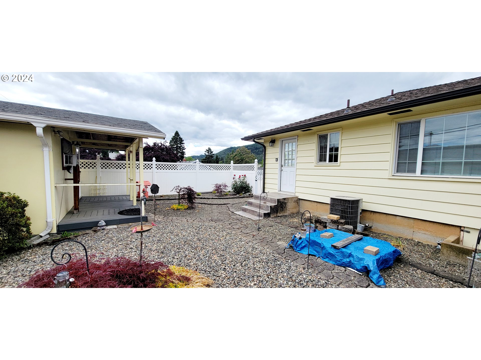 611 East 3rd Avenue Riddle, OR 97469 - Photo 37 of 42 a view of a house with backyard