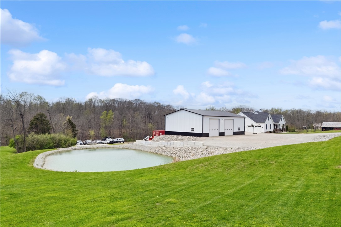 1158 Pyle Road Clarksville, OH 45113 - Photo 7 of 76 Expansive rural property featuring a picturesque pond and practical outbuildings.