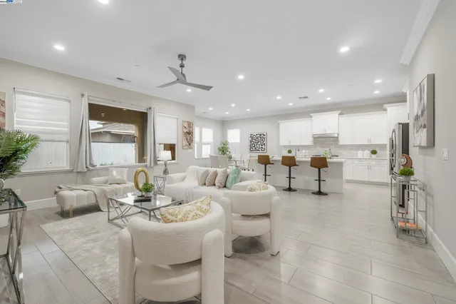 a living room with furniture and a table