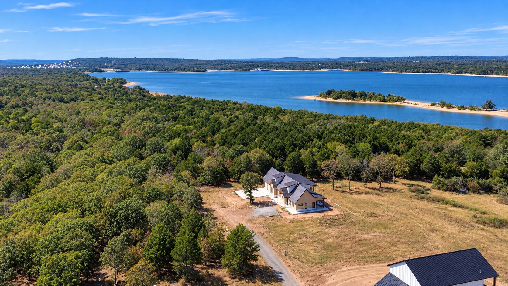62 Dixie Ridge Eufaula, OK 74432 - Photo 1 of 9 Expansive waterside property with mature trees and a clear water body