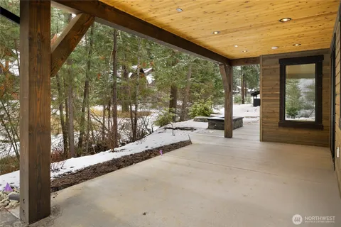 a living room with large windows