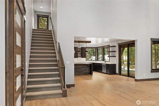 a view of living room with furniture and window