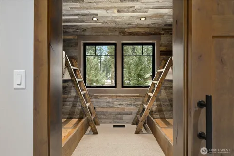 a front view of a house with a garage