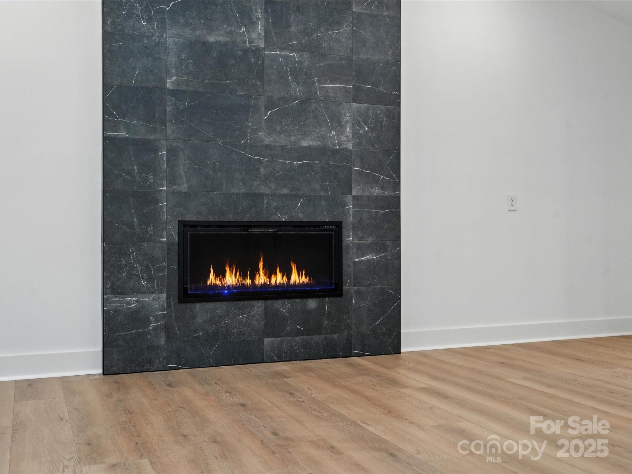 3303 Reid Circle Monroe, NC 28112 - Photo 17 of 44 a room with a fireplace