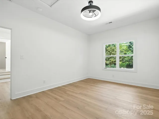 a view of a yard with a trees