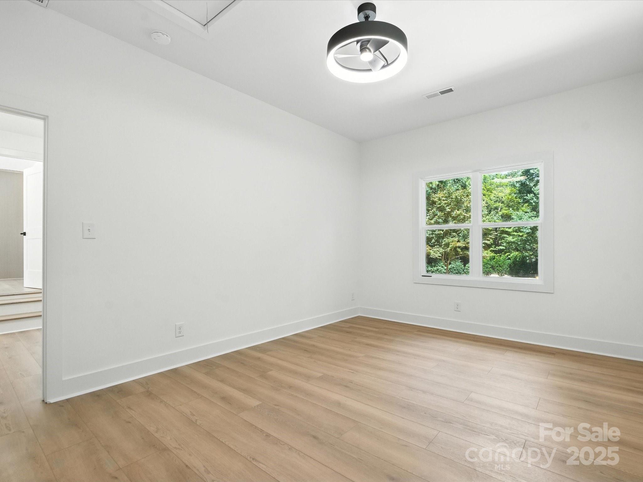 3303 Reid Circle Monroe, NC 28112 - Photo 30 of 44 an empty room with a window