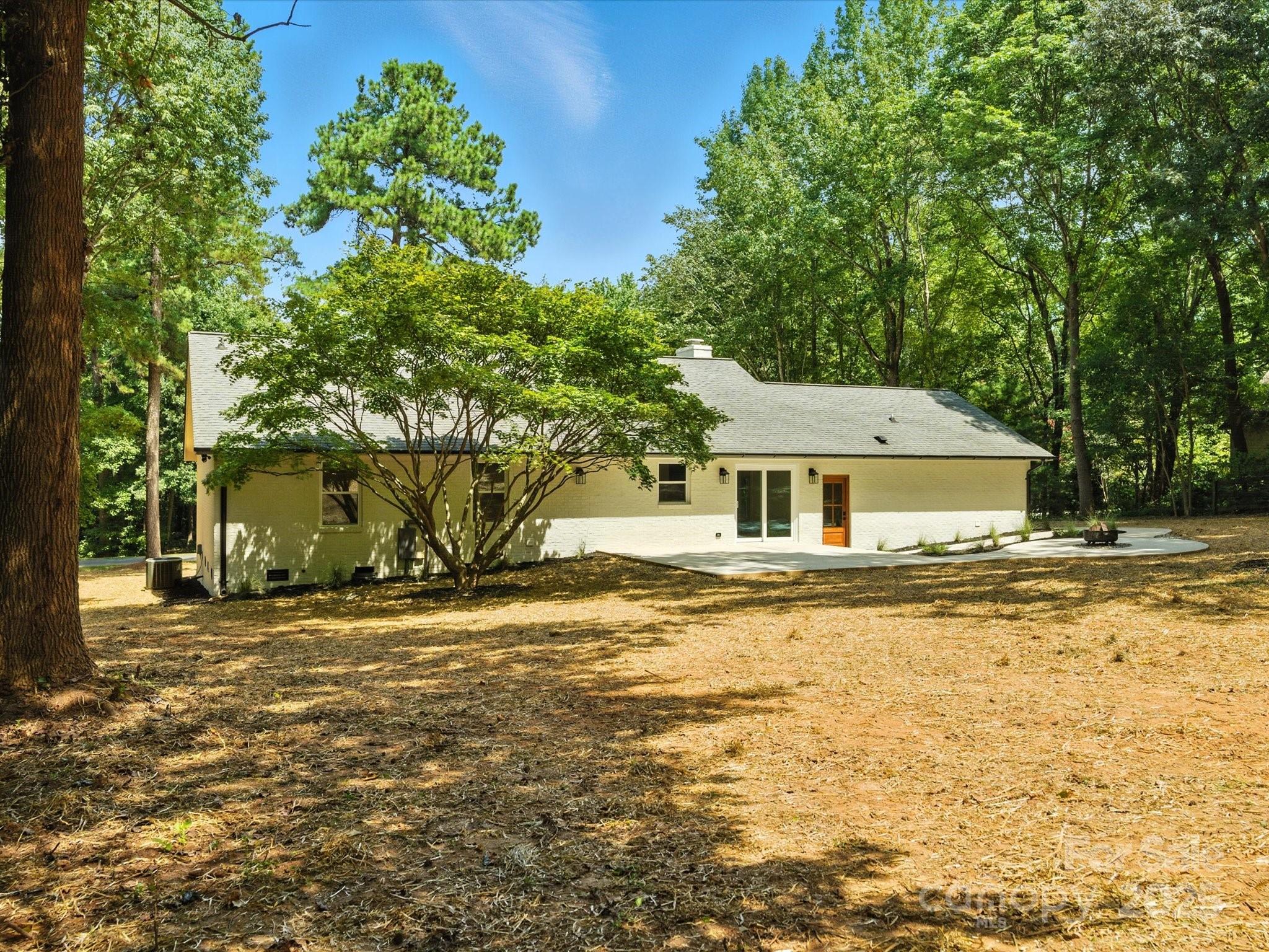 3303 Reid Circle Monroe, NC 28112 - Photo 36 of 44 a house with swimming pool in front of it