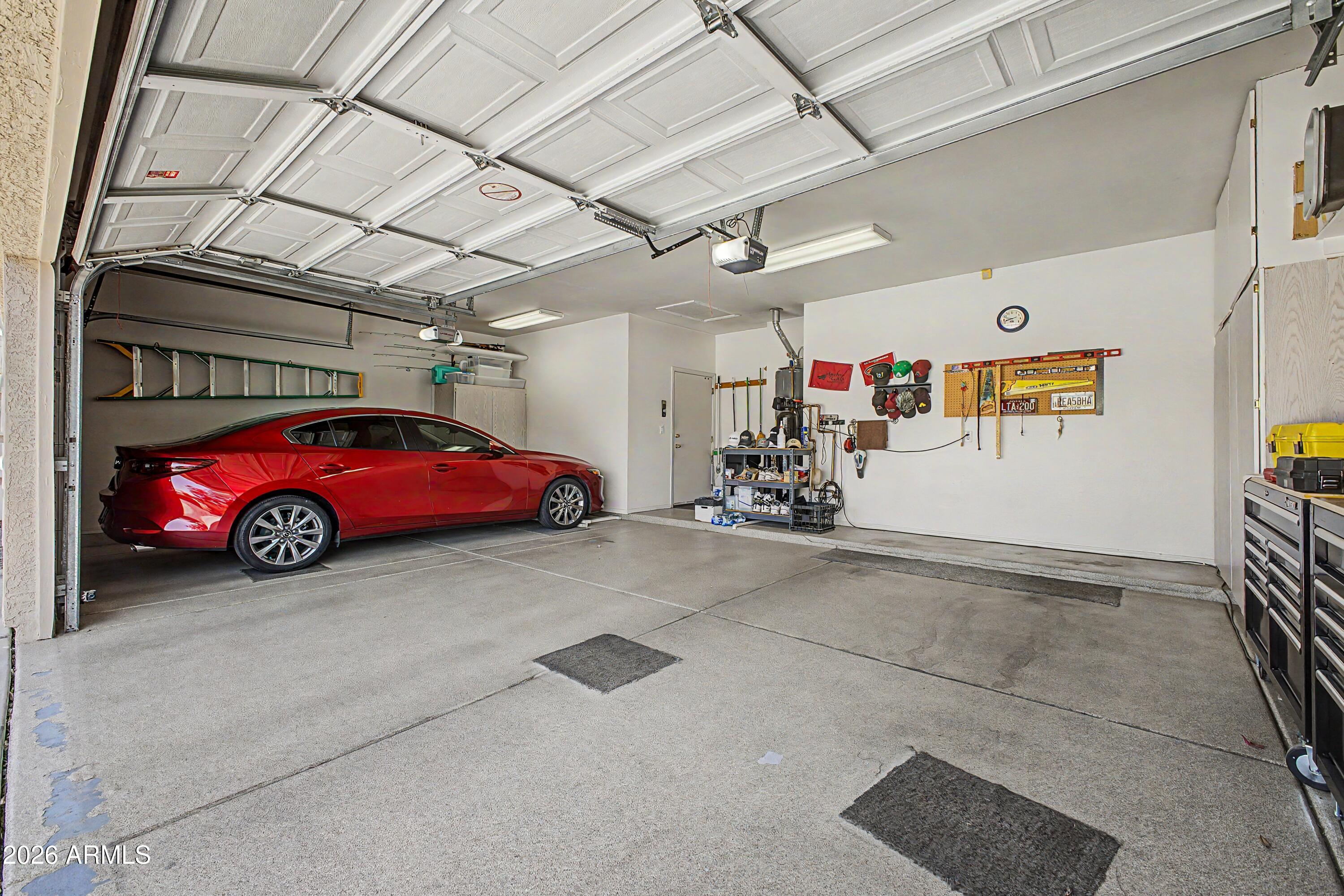 433 West Desert Avenue Gilbert, AZ 85233 - Photo 21 of 23 a view of parking garage with cars