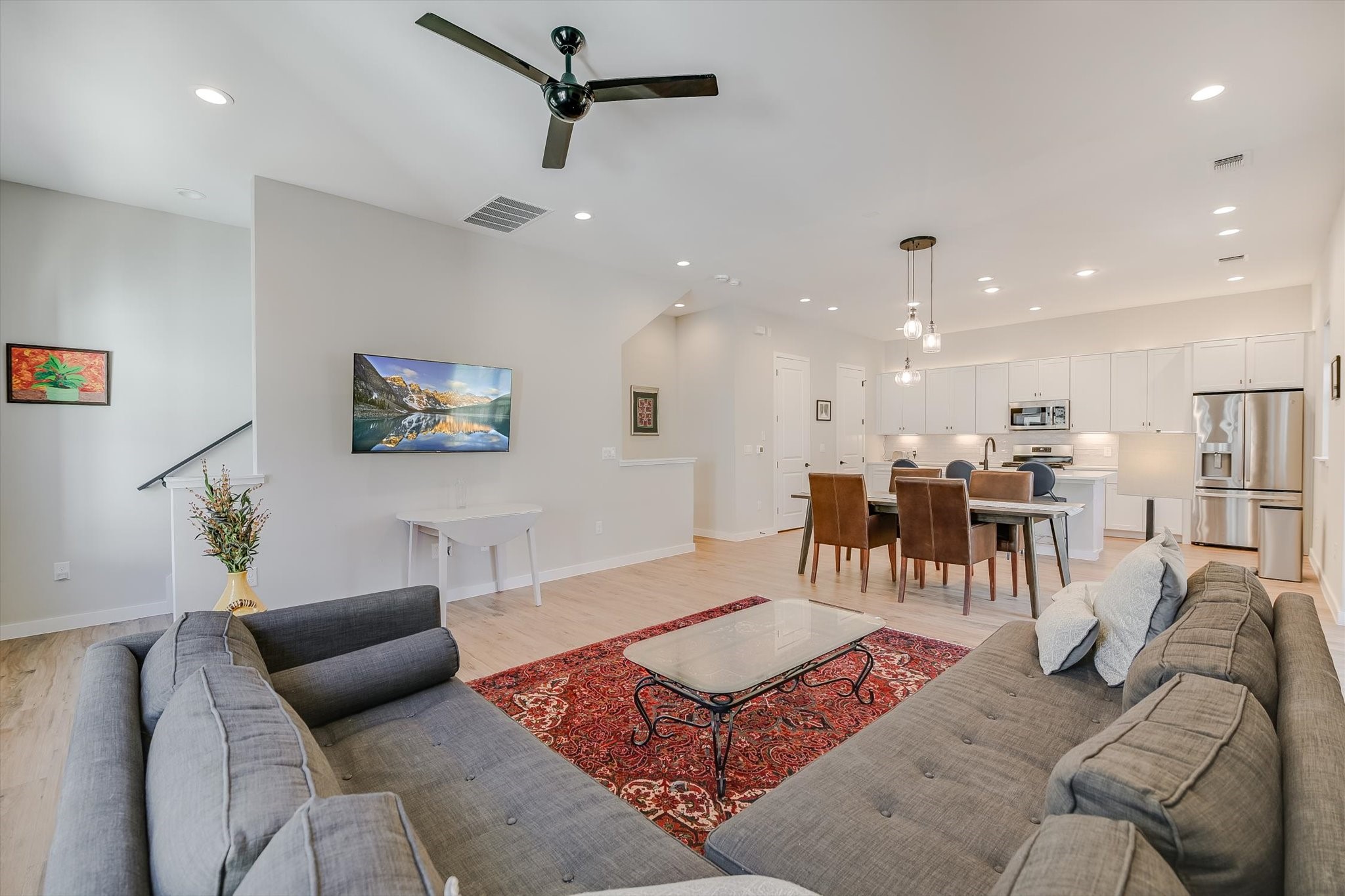 3809 Valley View Road, Unit 7 Austin, TX 78704 - Photo 5 of 21 Living room featuring light hardwood / wood-style floors and ceiling fan