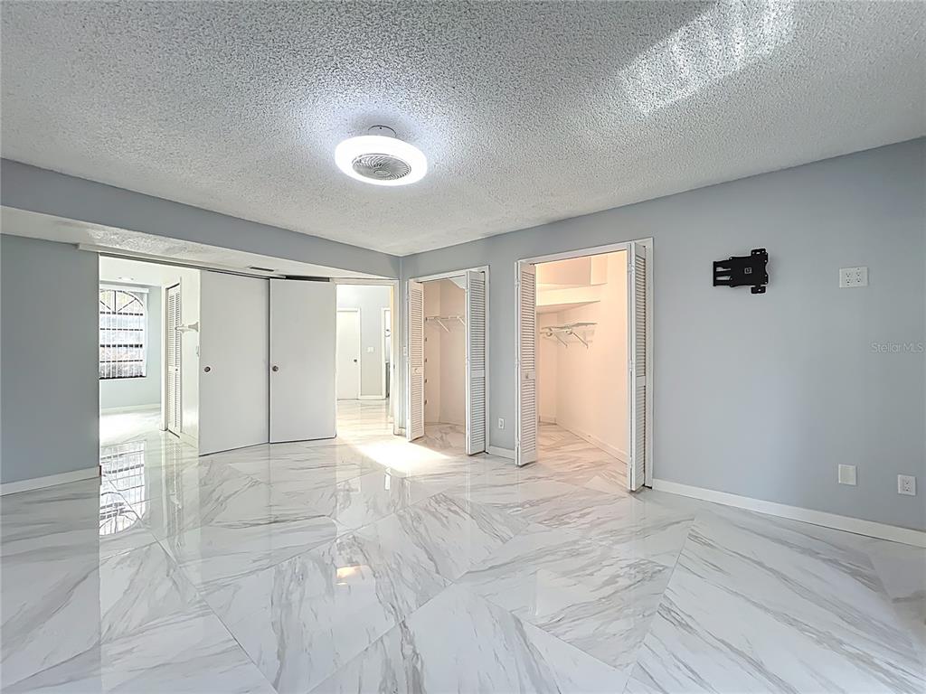 622 Anhinga Road Winter Springs, FL 32708 - Photo 22 of 53 a view of an empty room with window and bathroom