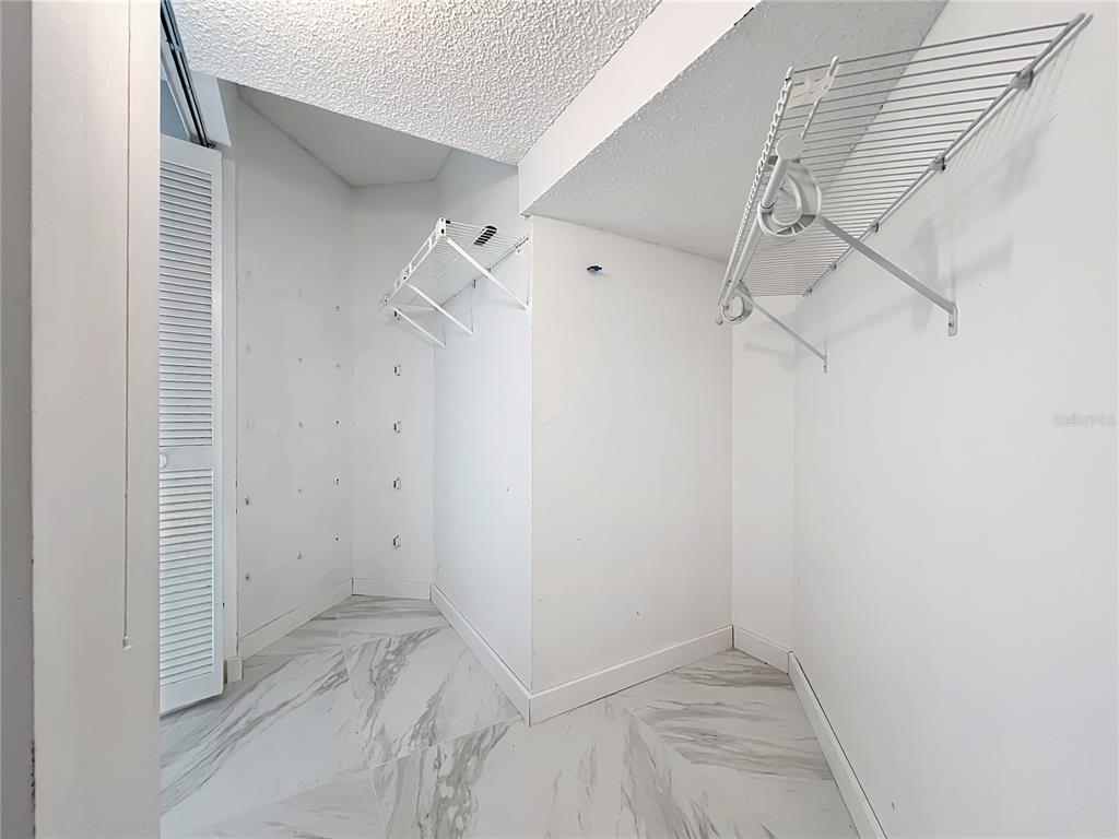 622 Anhinga Road Winter Springs, FL 32708 - Photo 24 of 53 a view of a room with racks on the wall