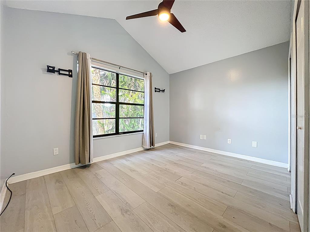 622 Anhinga Road Winter Springs, FL 32708 - Photo 34 of 53 wooden floor in an empty room with a window