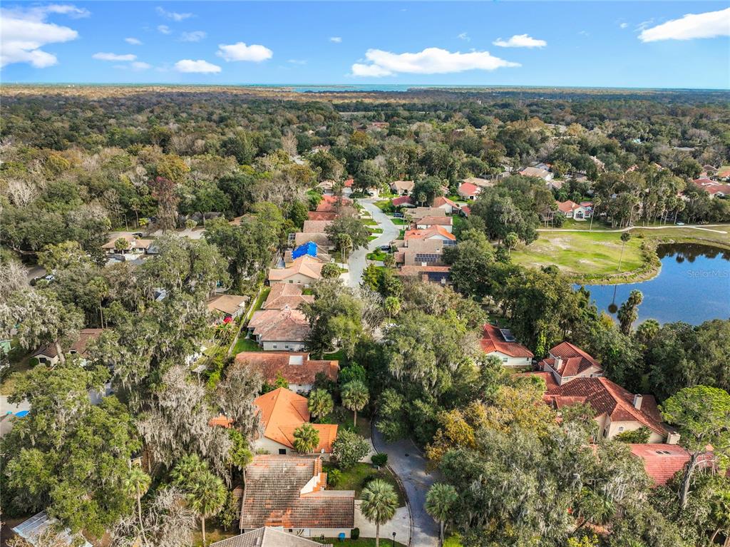 622 Anhinga Road Winter Springs, FL 32708 - Photo 48 of 53 an aerial view of residential houses with outdoor space and trees