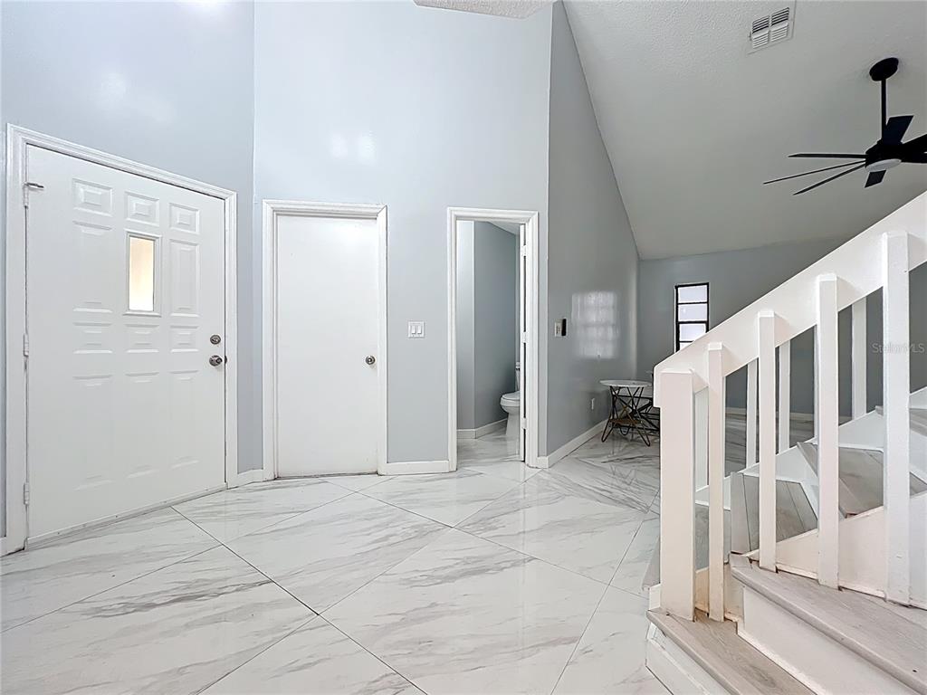 622 Anhinga Road Winter Springs, FL 32708 - Photo 5 of 53 a view of entryway with stairs