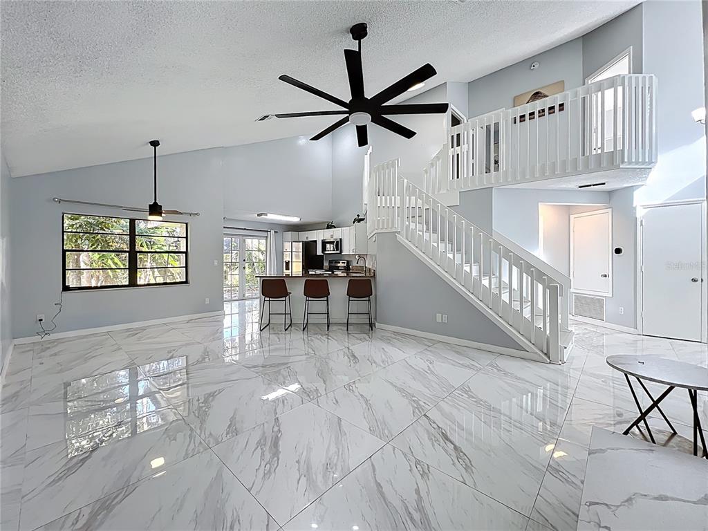 622 Anhinga Road Winter Springs, FL 32708 - Photo 7 of 53 a view of dining room and hall with furniture