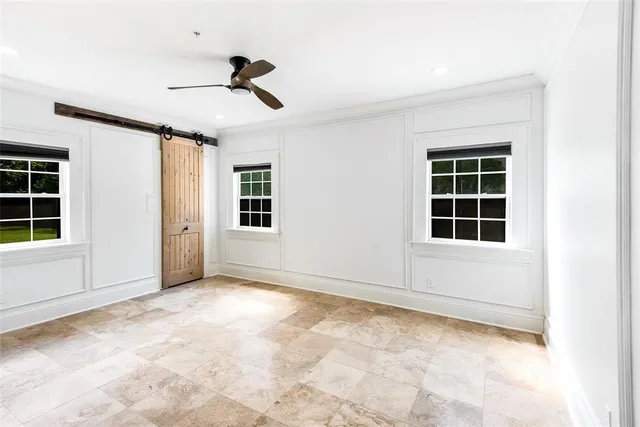 a kitchen with stainless steel appliances granite countertop a sink and a stove