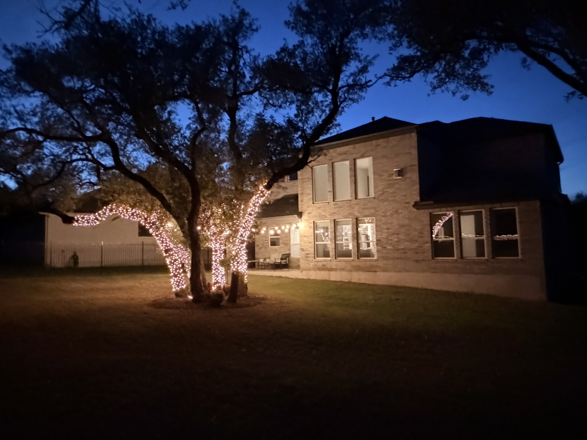 249 Running Bird Road Austin, TX 78737 - Photo 38 of 40 a front view of a house with a yard