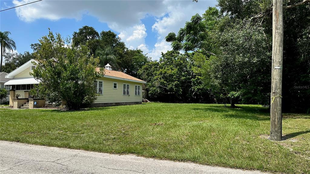 a house view with a garden space