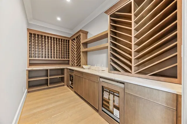 a spacious bathroom with a granite countertop sink a toilet and shower