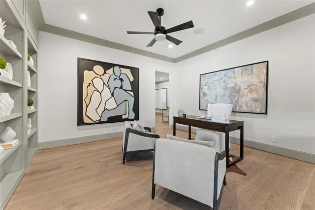 a bathroom with double vanity and a shower