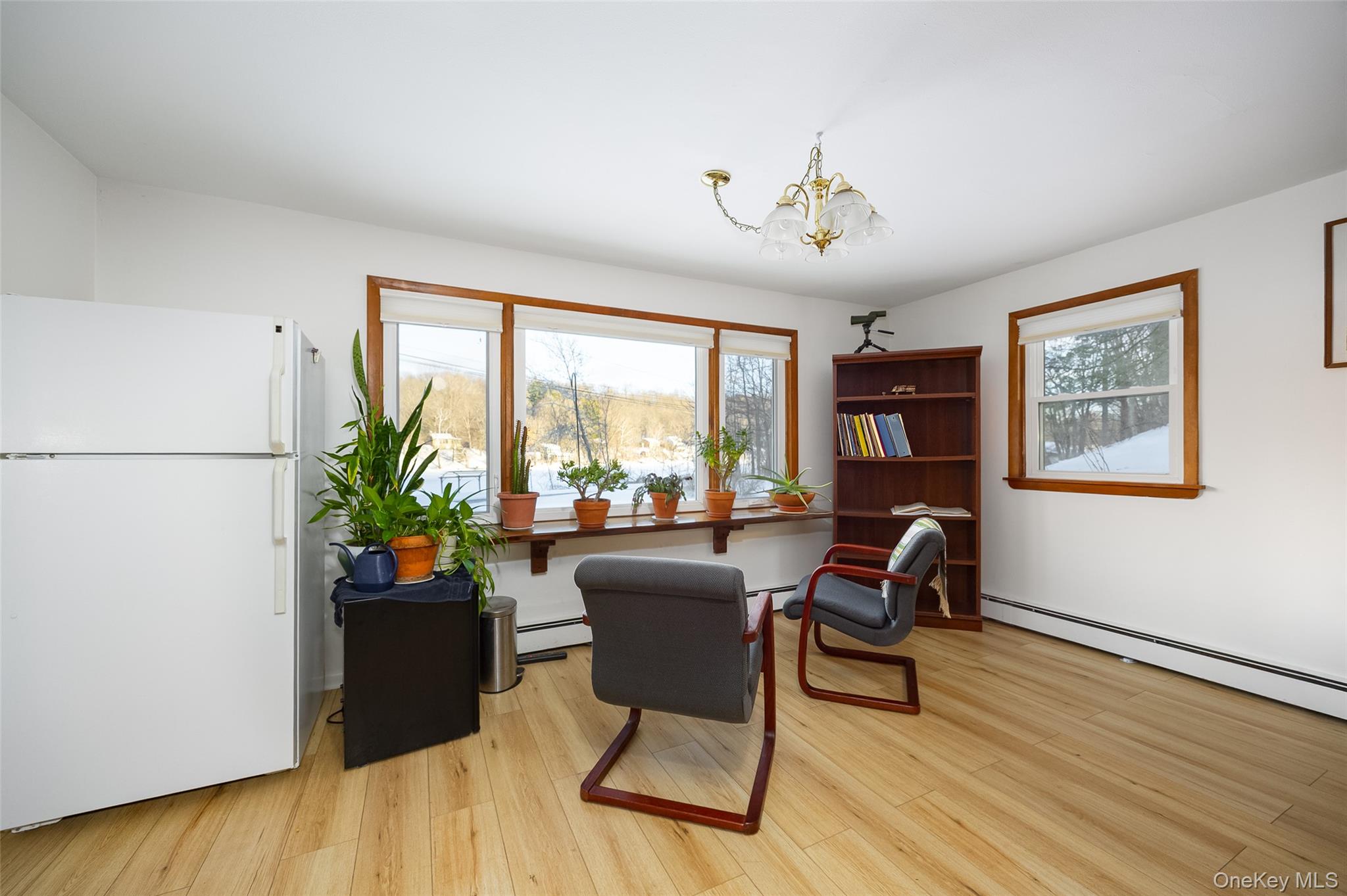 563 Spring Lake Road Red Hook, NY 12571 - Photo 13 of 33 a living room with furniture and a large window