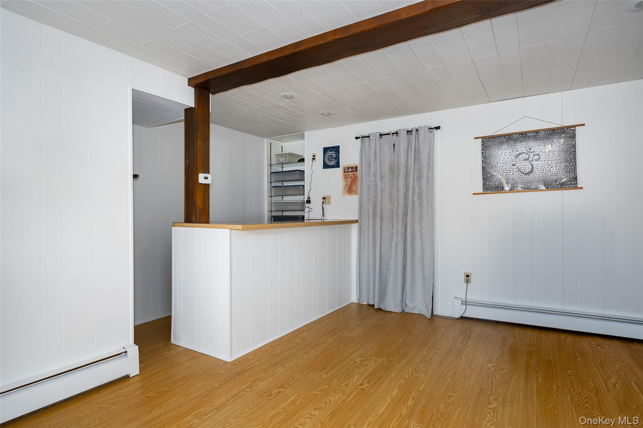 563 Spring Lake Road Red Hook, NY 12571 - Photo 18 of 33 a view of a room with wooden floor and cabinet