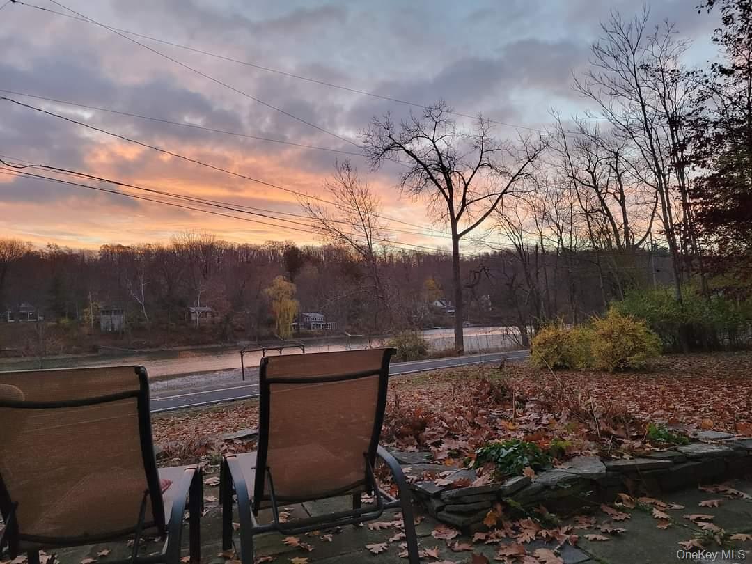 563 Spring Lake Road Red Hook, NY 12571 - Photo 31 of 33 a view of a chairs and table in the backyard