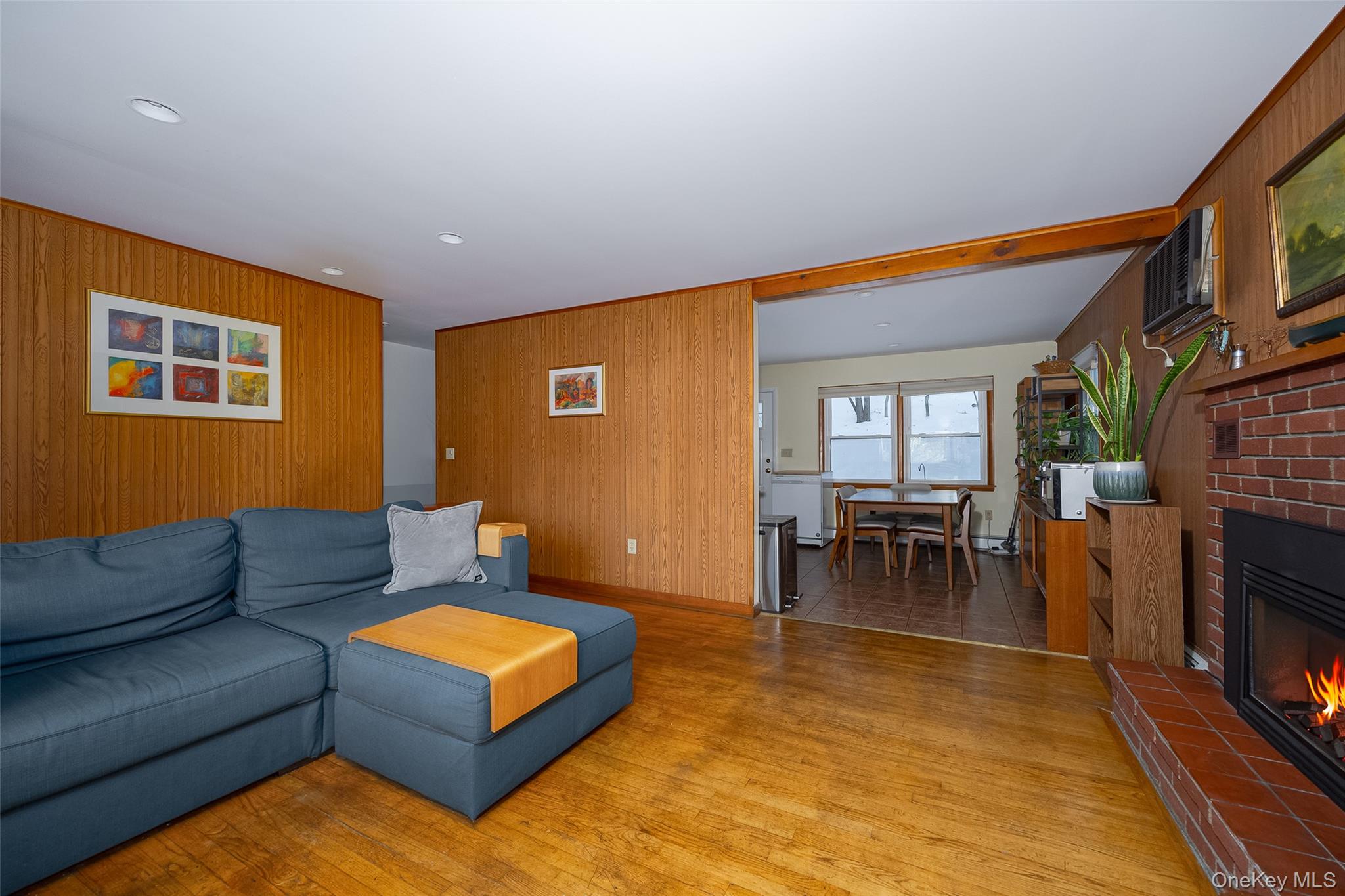 563 Spring Lake Road Red Hook, NY 12571 - Photo 4 of 33 a living room with furniture and a flat screen tv
