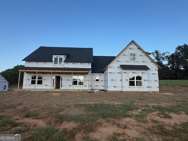 1010 Shoreline Drive Madison, GA 30650 - Photo 1 of 1 a front view of a house with a yard