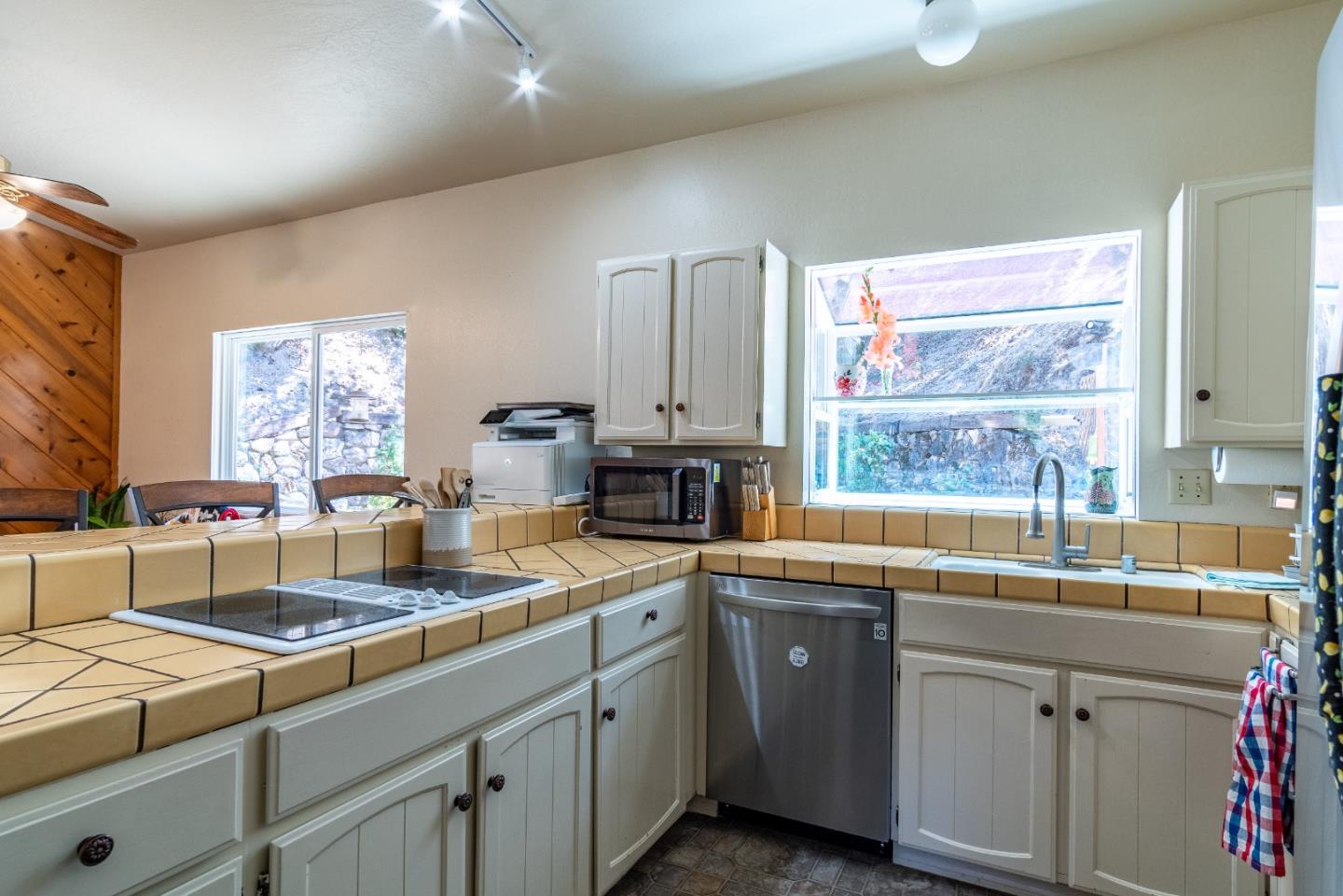 161 San Benancio Road Salinas, CA 93908 - Photo 11 of 44 a kitchen that has a sink and a stove in it