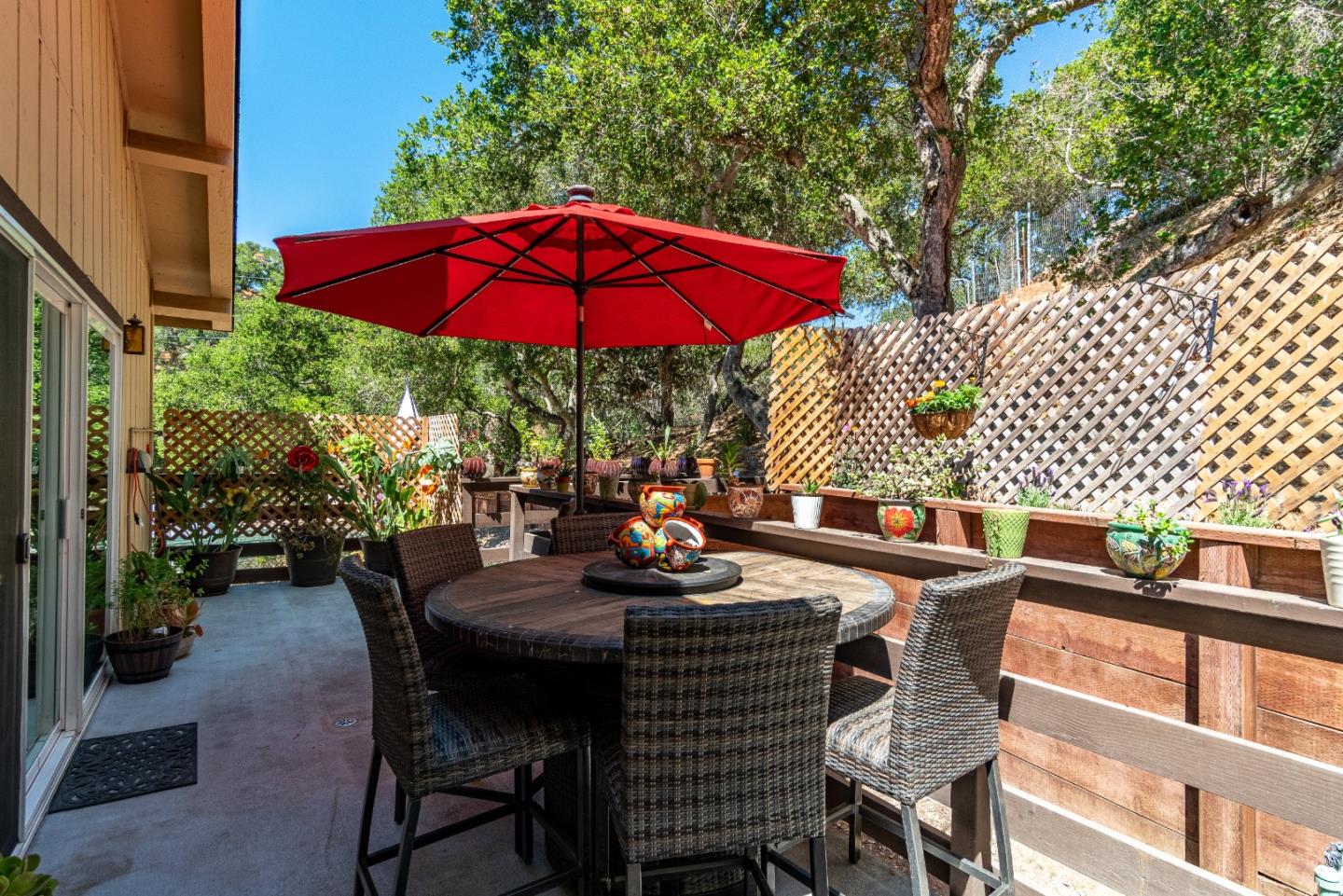 161 San Benancio Road Salinas, CA 93908 - Photo 26 of 44 a view of a patio with table and chairs under an umbrella