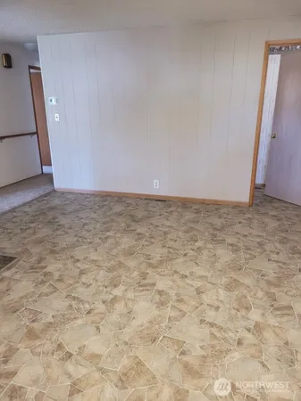 a view of a room with an empty space