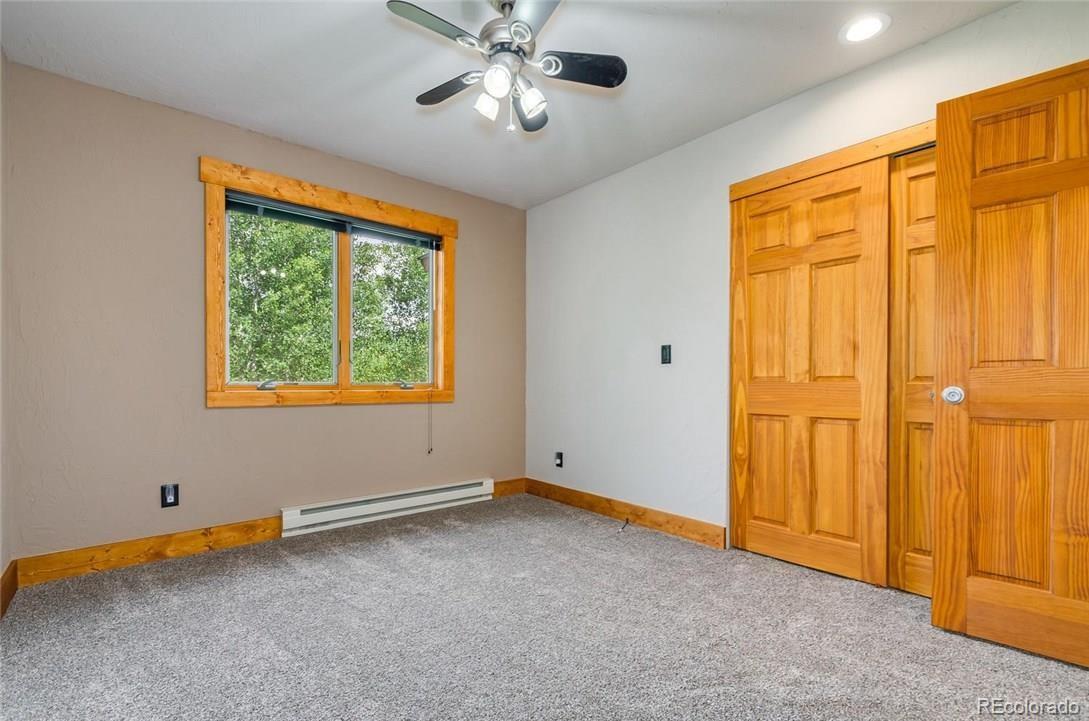 115 County Road 1014 Silverthorne, CO 80498 - Photo 14 of 20 a view of an empty room with a window