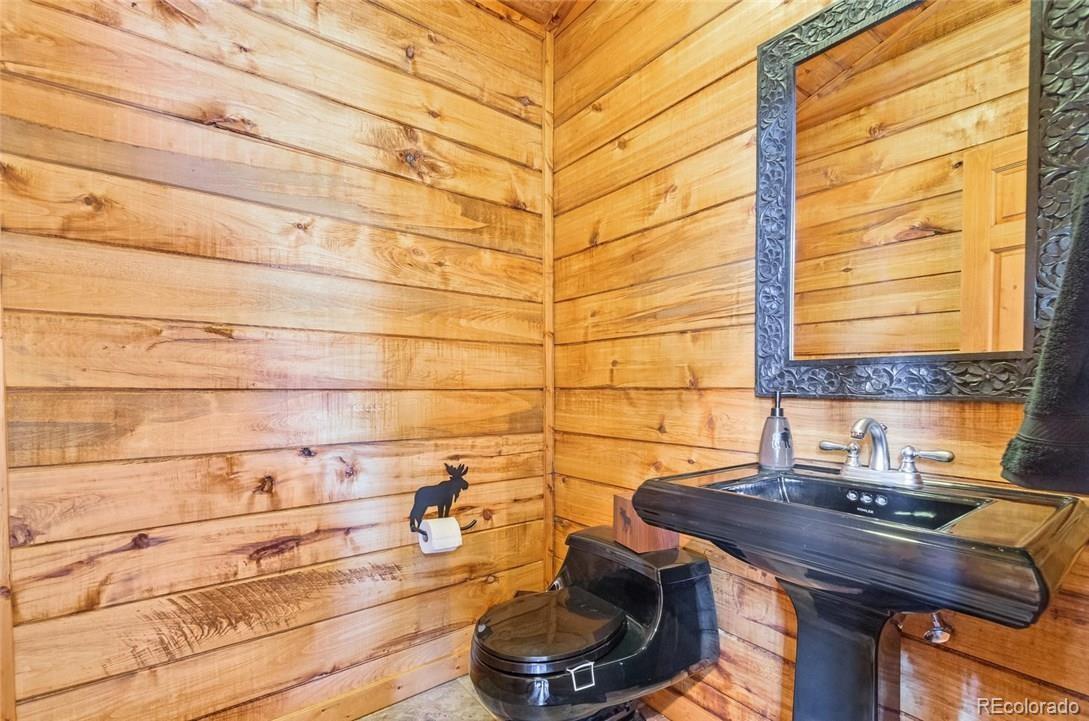115 County Road 1014 Silverthorne, CO 80498 - Photo 17 of 20 a bathroom with a sink and a vanity