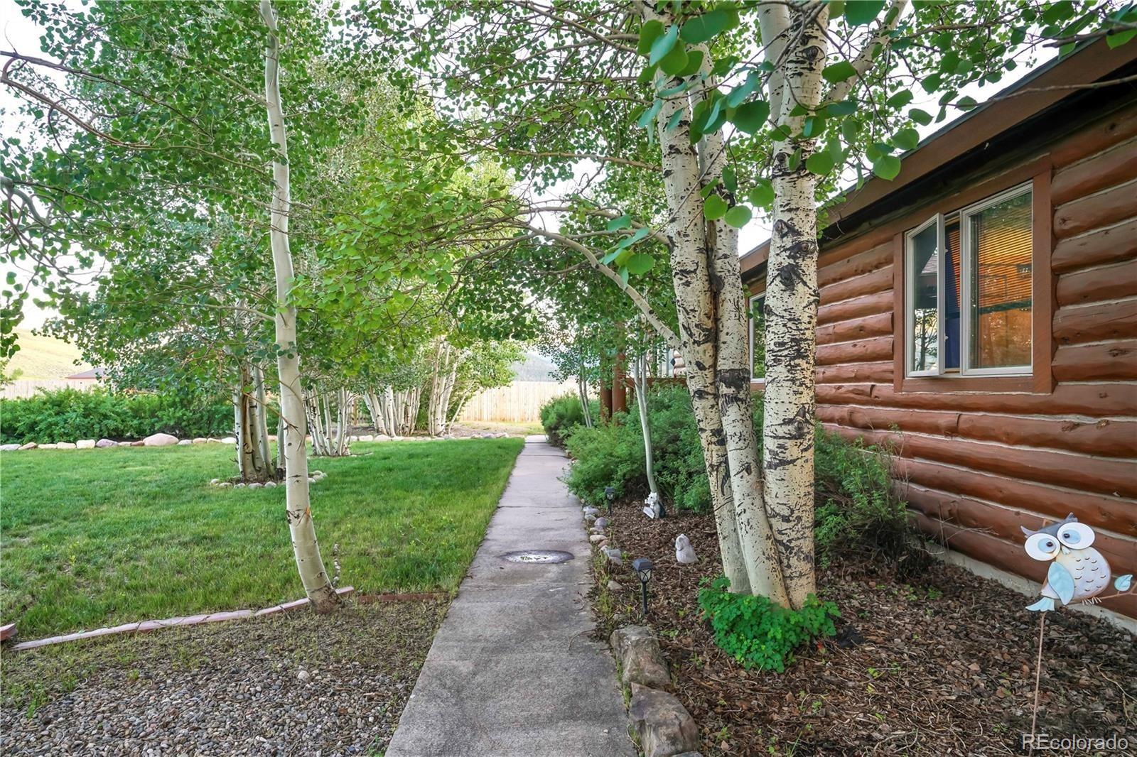 115 County Road 1014 Silverthorne, CO 80498 - Photo 5 of 20 a pathway of a house with a yard