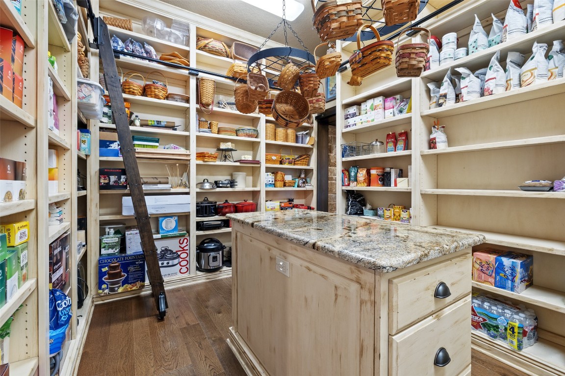 1039 Bluewater Place Spring Branch, TX 78070 - Photo 15 of 40 a view of walk in closet with clothes and shoes