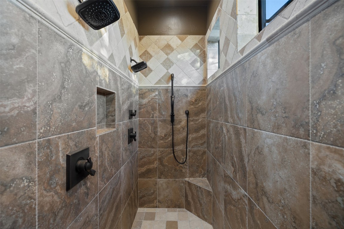 1039 Bluewater Place Spring Branch, TX 78070 - Photo 20 of 40 a bathroom with a shower