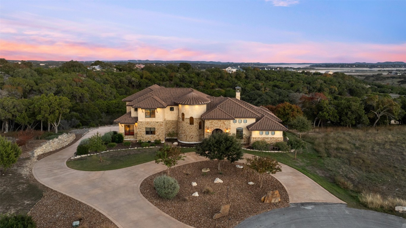 1039 Bluewater Place Spring Branch, TX 78070 - Photo 2 of 40 a view of a house with a yard and street