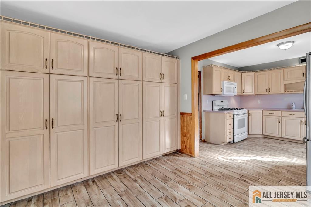 306 Austin Avenue Old Bridge, NJ 08857 - Photo 16 of 39 a view of a kitchen with wooden cabinet