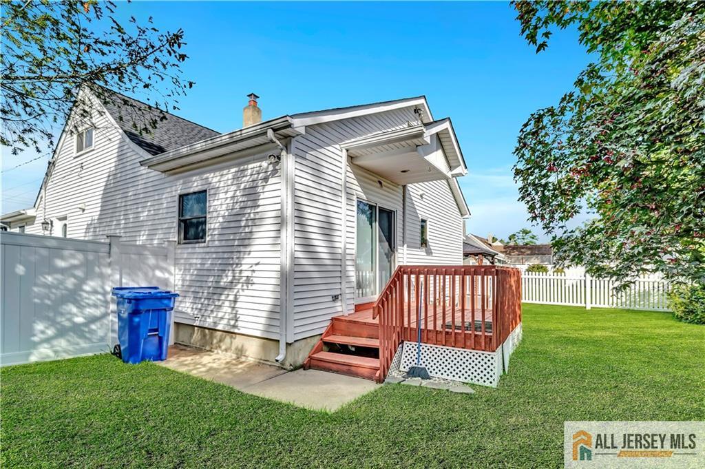 306 Austin Avenue Old Bridge, NJ 08857 - Photo 36 of 39 a front view of a house with garden