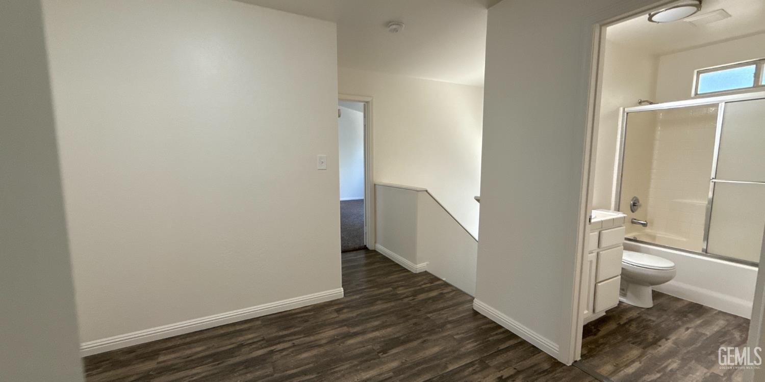 Undisclosed Address Bakersfield, CA 93312 - Photo 15 of 20 a bathroom with a toilet and a shower