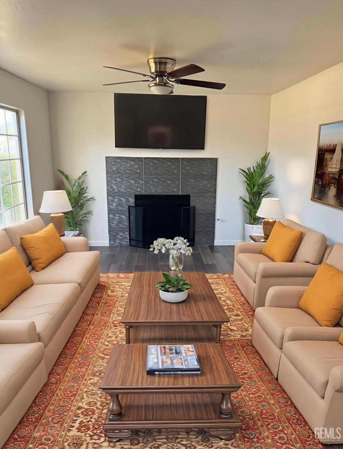Undisclosed Address Bakersfield, CA 93312 - Photo 4 of 20 a living room with furniture and a fireplace